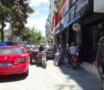 Chinese traffic, driving through the pavement